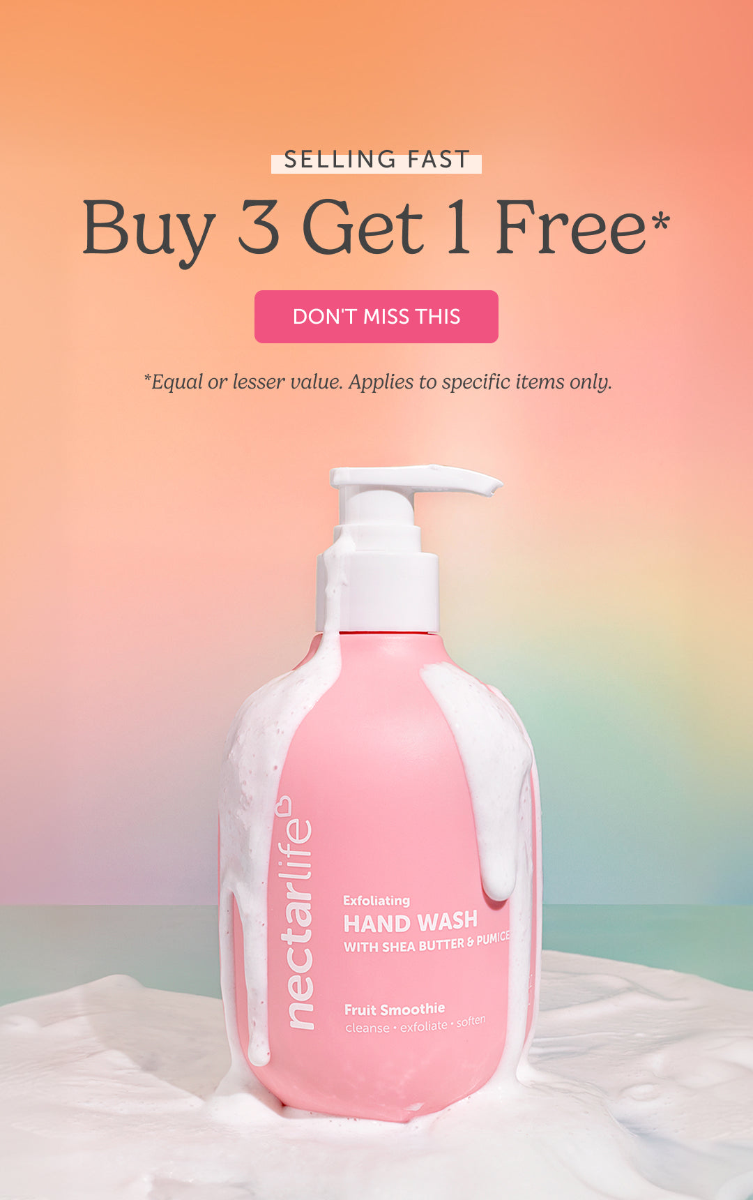 Nectar Life Fruit Smoothie Exfoliating Hand Wash with Shea Butter and Pumice bottle covered in white foam against a rainbow gradient background. Text reads: Selling Fast — Buy 3 Get 1 Free.