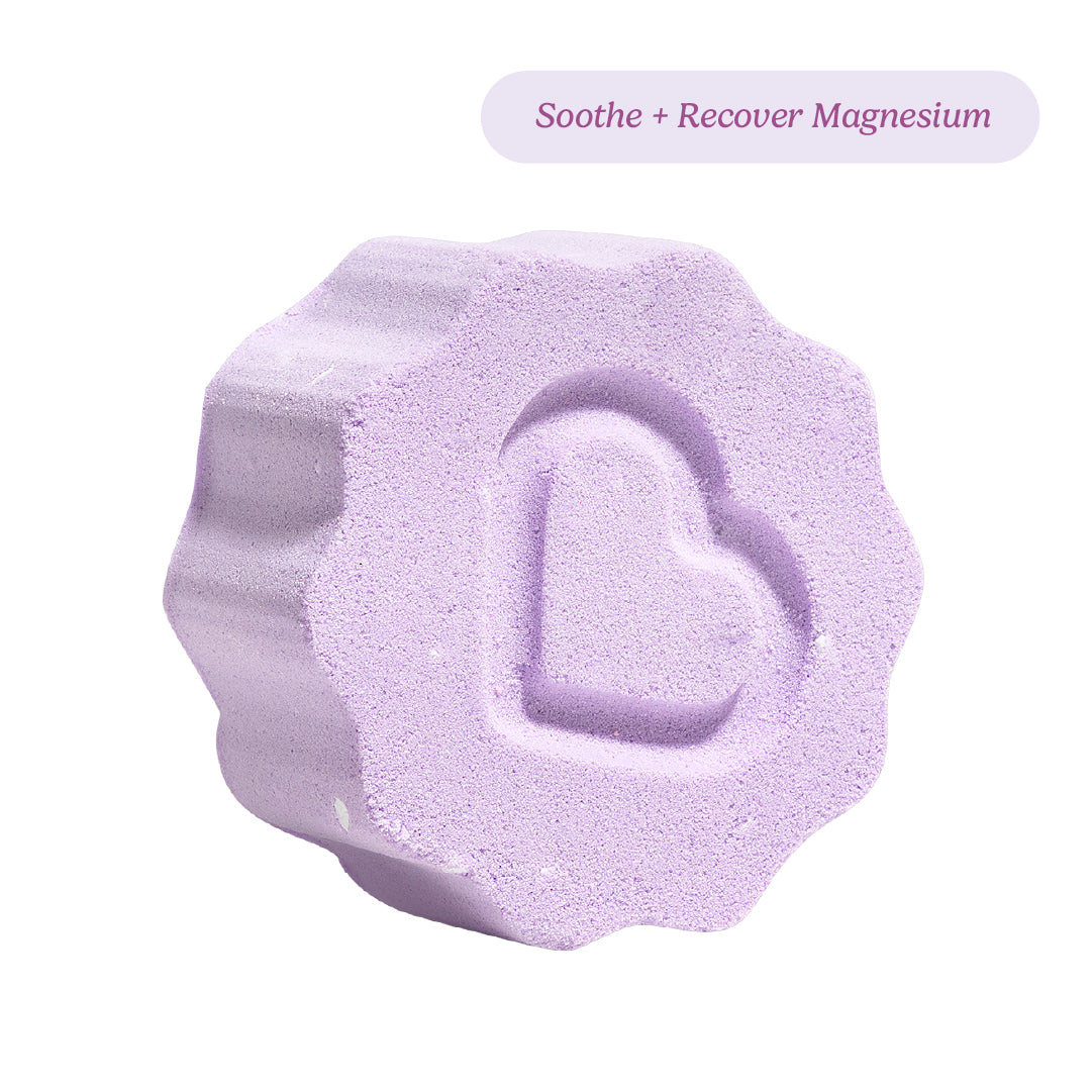 Nectar Life Essential Oil Benefit Bomb in Soothe + Recover Magnesium, purple wavy-edge bath bomb with heart emboss, magnesium chloride and lavender essential oil, handmade in Las Vegas, $11