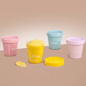 Nectar Life Body Polish all five scents, Lemon Squeeze Lavender Blossom Fruit Smoothie Ocean Breeze Peach Sangria, colorful tubs grouped on warm background, handmade in Las Vegas