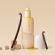 Nectar Life Vanilla Brûlée Dry Body Oil bottle with golden oil and vanilla bean props, glow-boosting dry body oil with olive squalane and rosehip, 3.4 fl oz