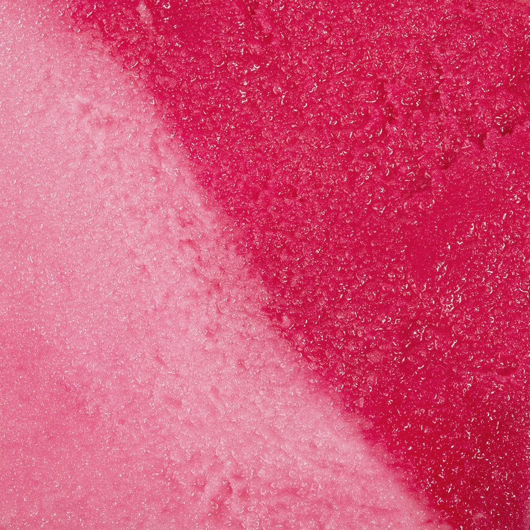 Strawberry Crème Sugar Body Scrub texture closeup showing pink sugar crystals, plant-based and sulfate-free formula by Nectar Life