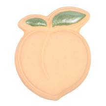 Nectar Life Peach Bath Bomb in Juicy Peach scent, shaped like a whole peach with glittery green leaf detail and soft peach-orange body, handmade bath bomb